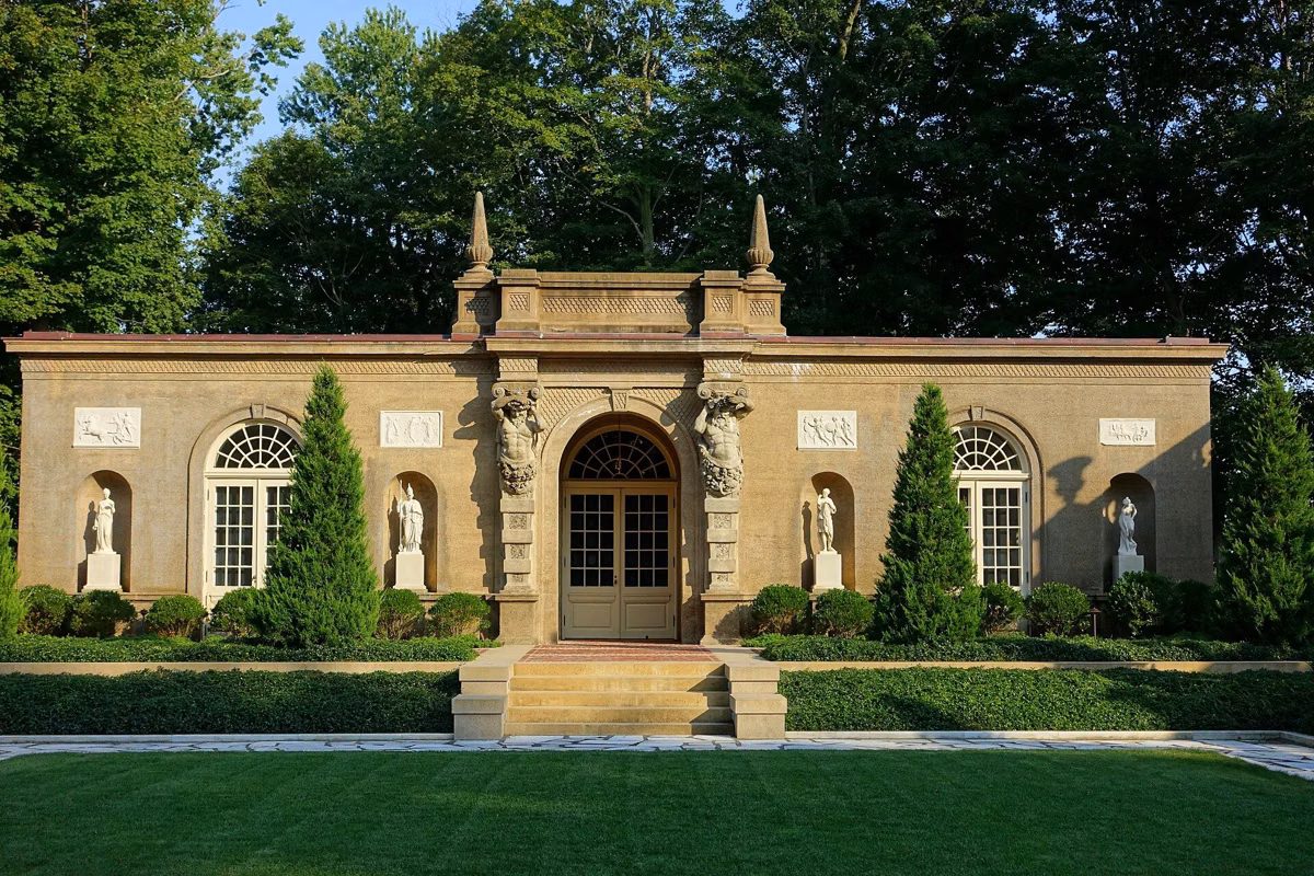 The Casino building at Castle Hill, a stone garden pavilion with statues in niches